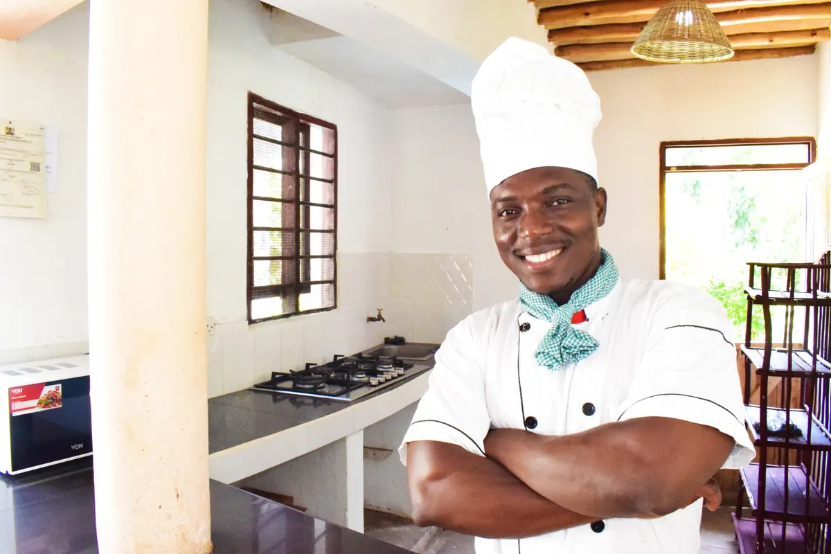 Chef preparing fresh coastal cuisine at Raquel's Bliss